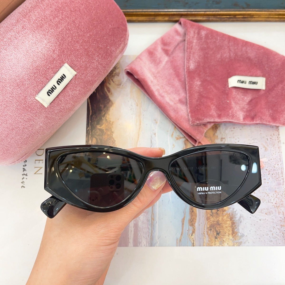 MIU M SUNGLASSES