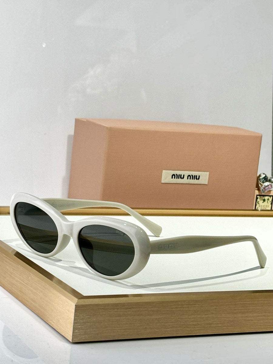 MIU M SUNGLASSES