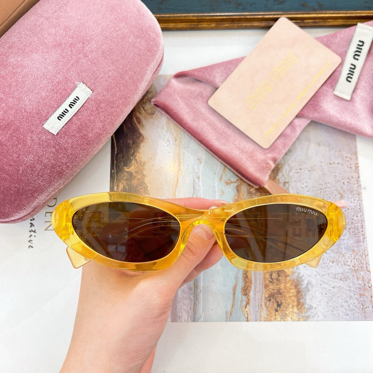 MIU M SUNGLASSES