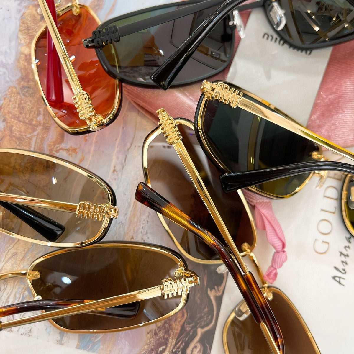 MIU M SUNGLASSES
