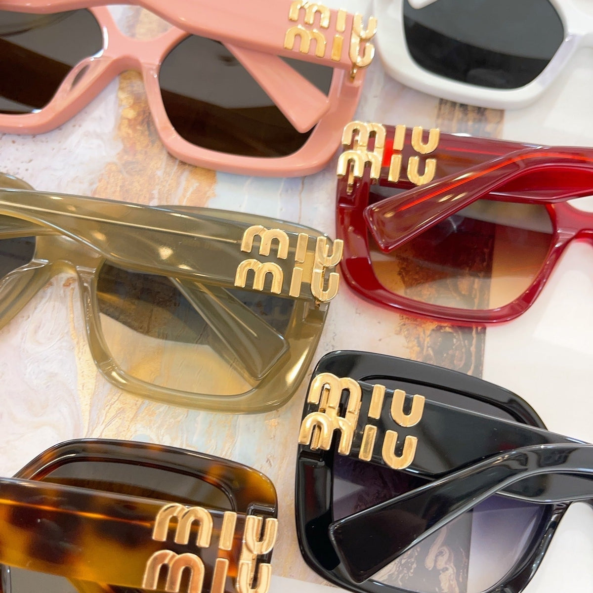 MIU M SUNGLASSES