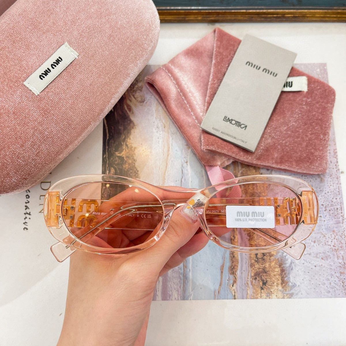 MIU M SUNGLASSES