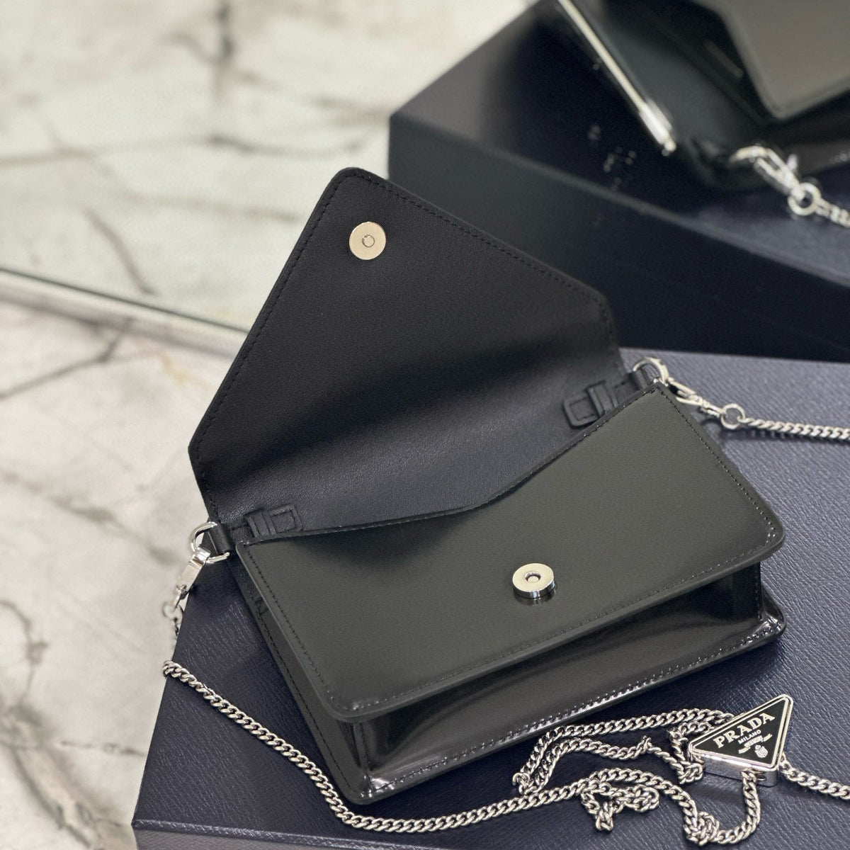 PD TRIANGLE LOGO BUFFED SHOULDER BAG