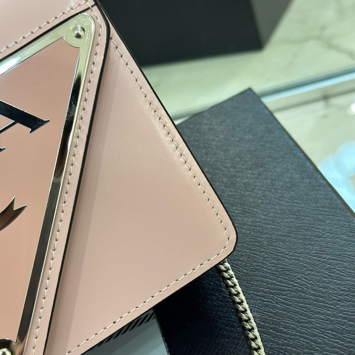 PD TRIANGLE LOGO BUFFED SHOULDER BAG
