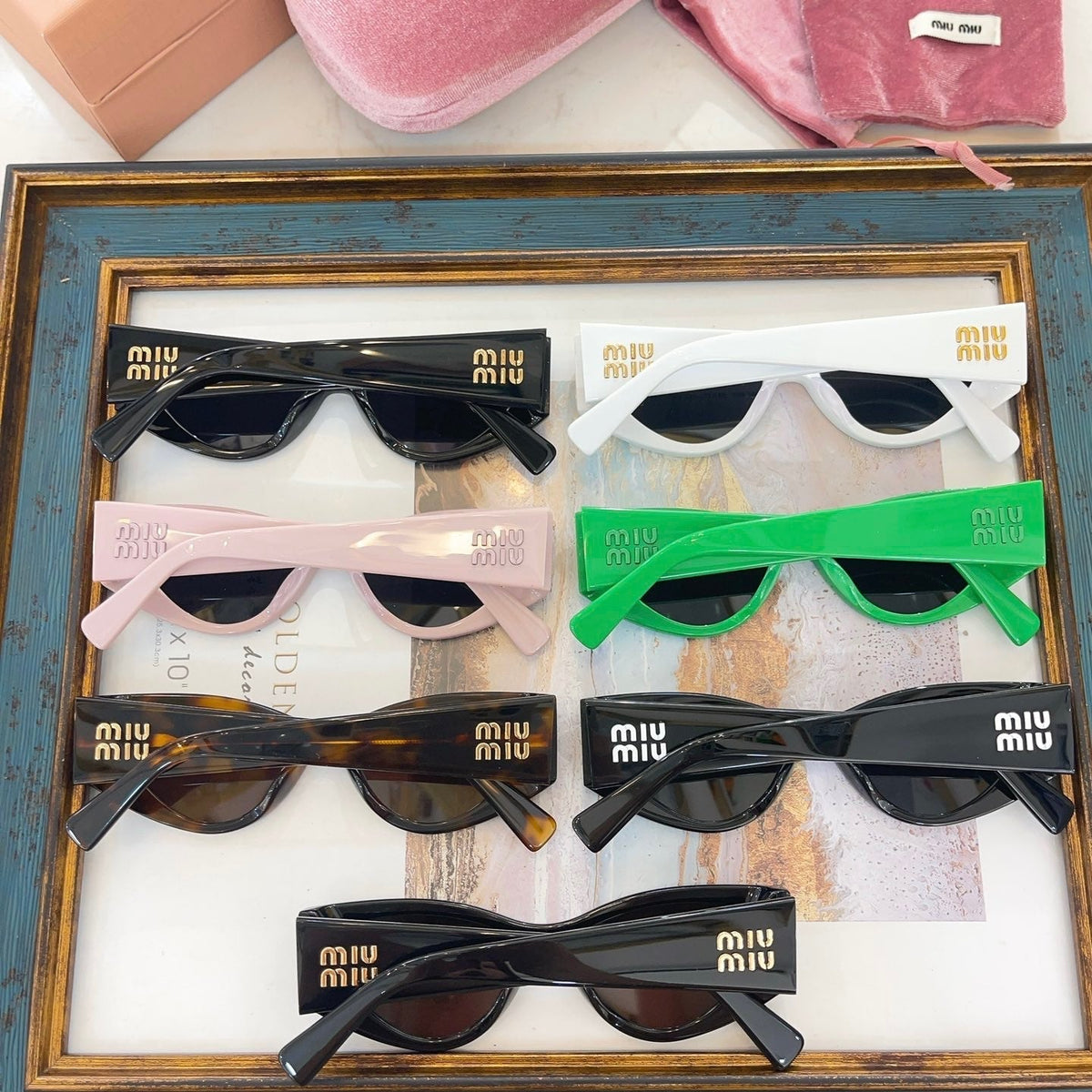 MIU M SUNGLASSES