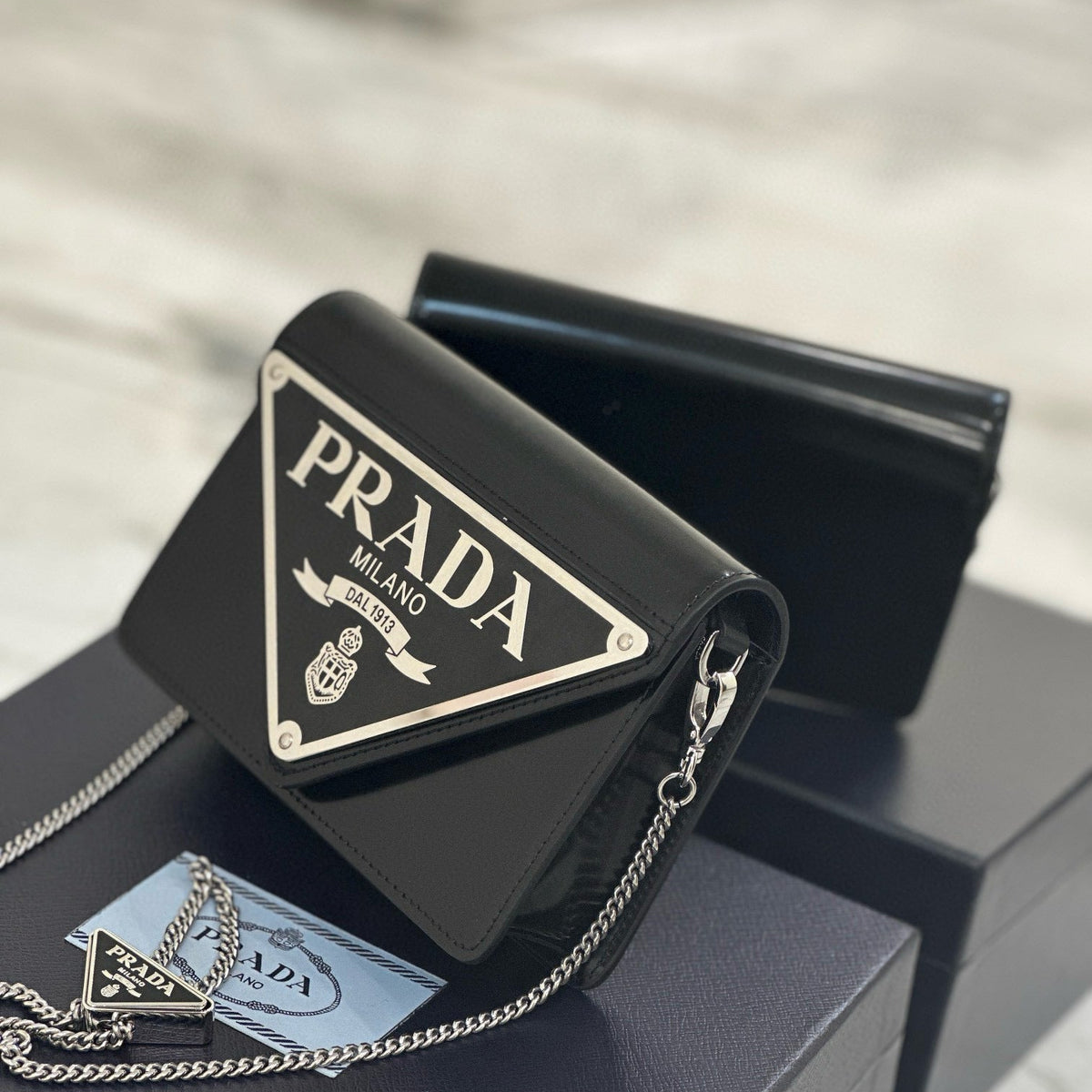PD TRIANGLE LOGO BUFFED SHOULDER BAG