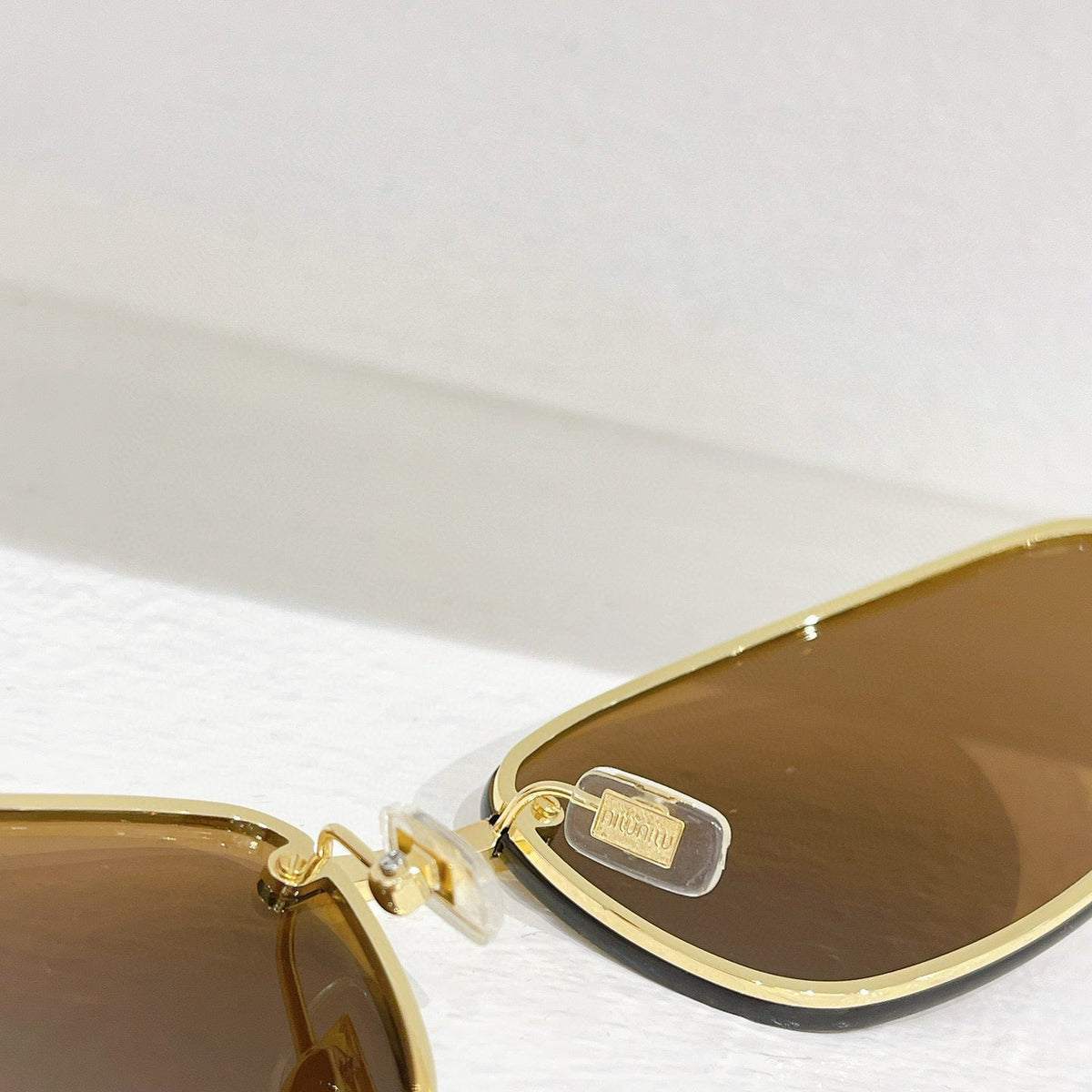 MIU M SUNGLASSES
