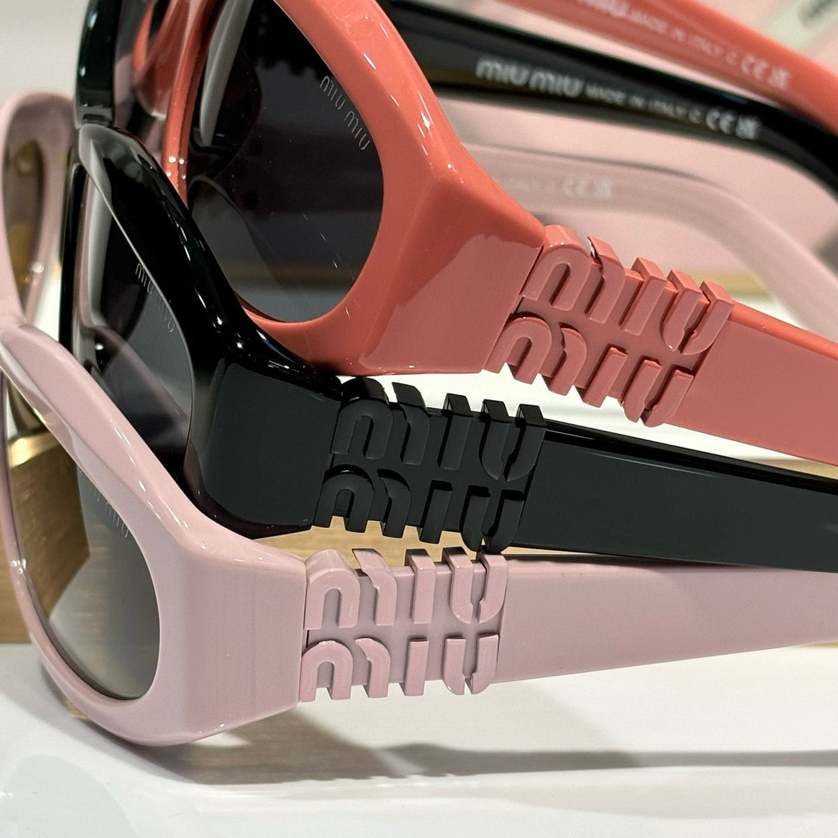 MIU M SUNGLASSES
