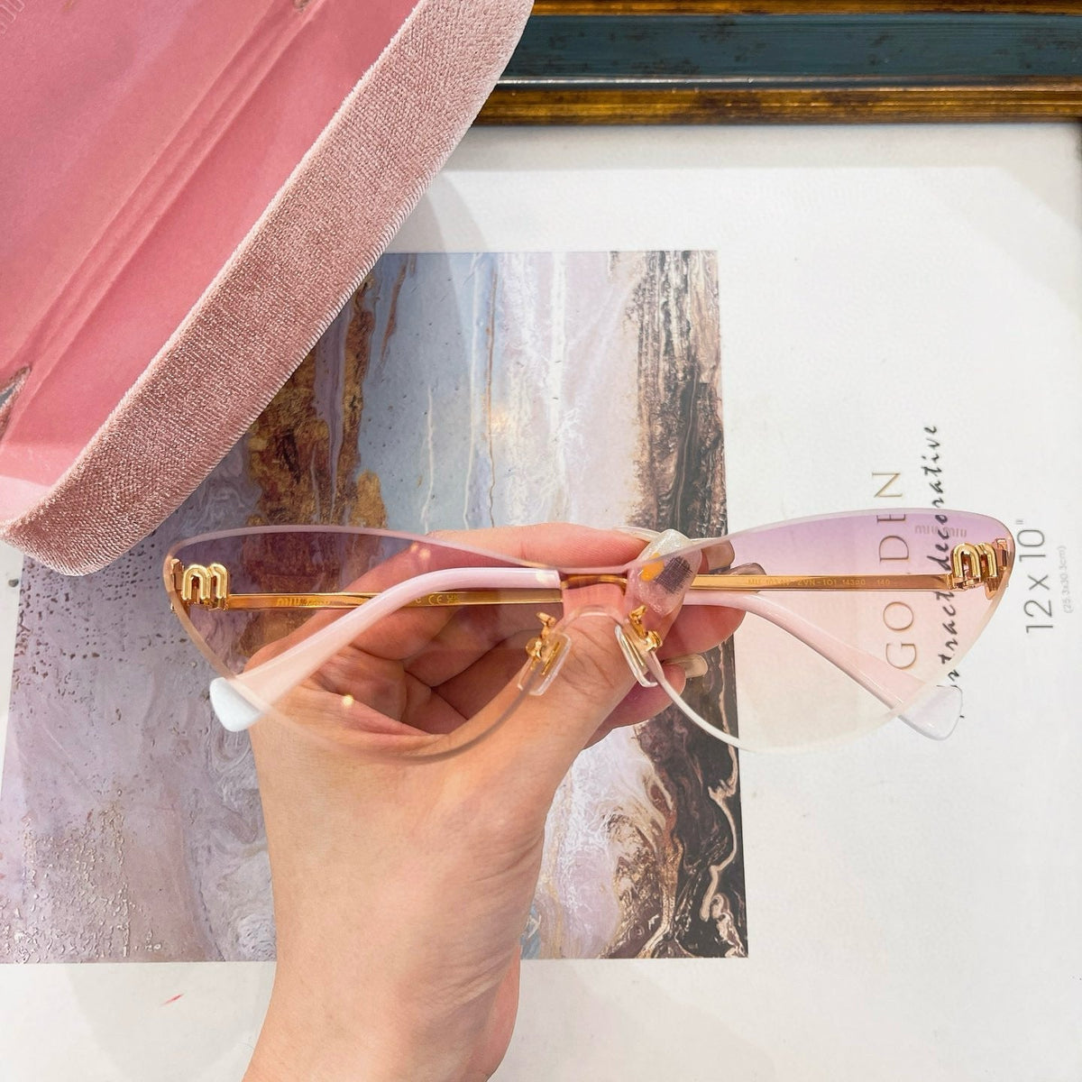 MIU M SUNGLASSES