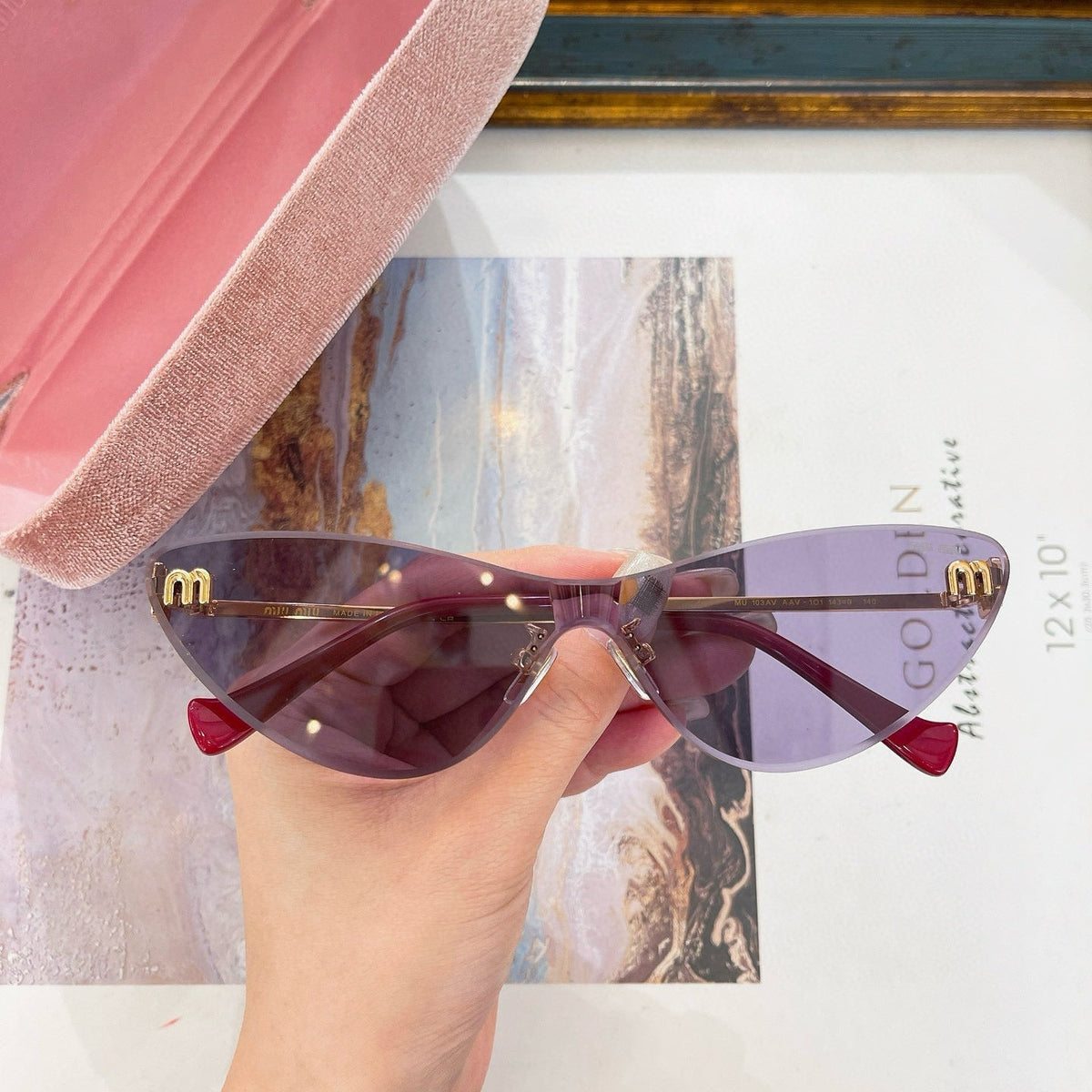 MIU M SUNGLASSES