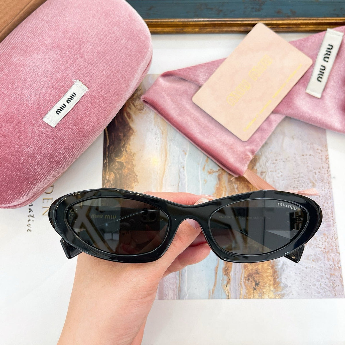 MIU M SUNGLASSES