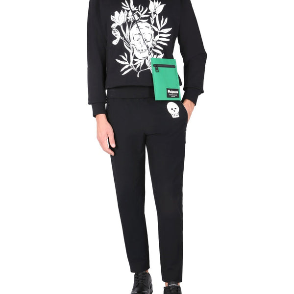 Alexander Mcqueen Men Jogging Pants With Embroidered Skull