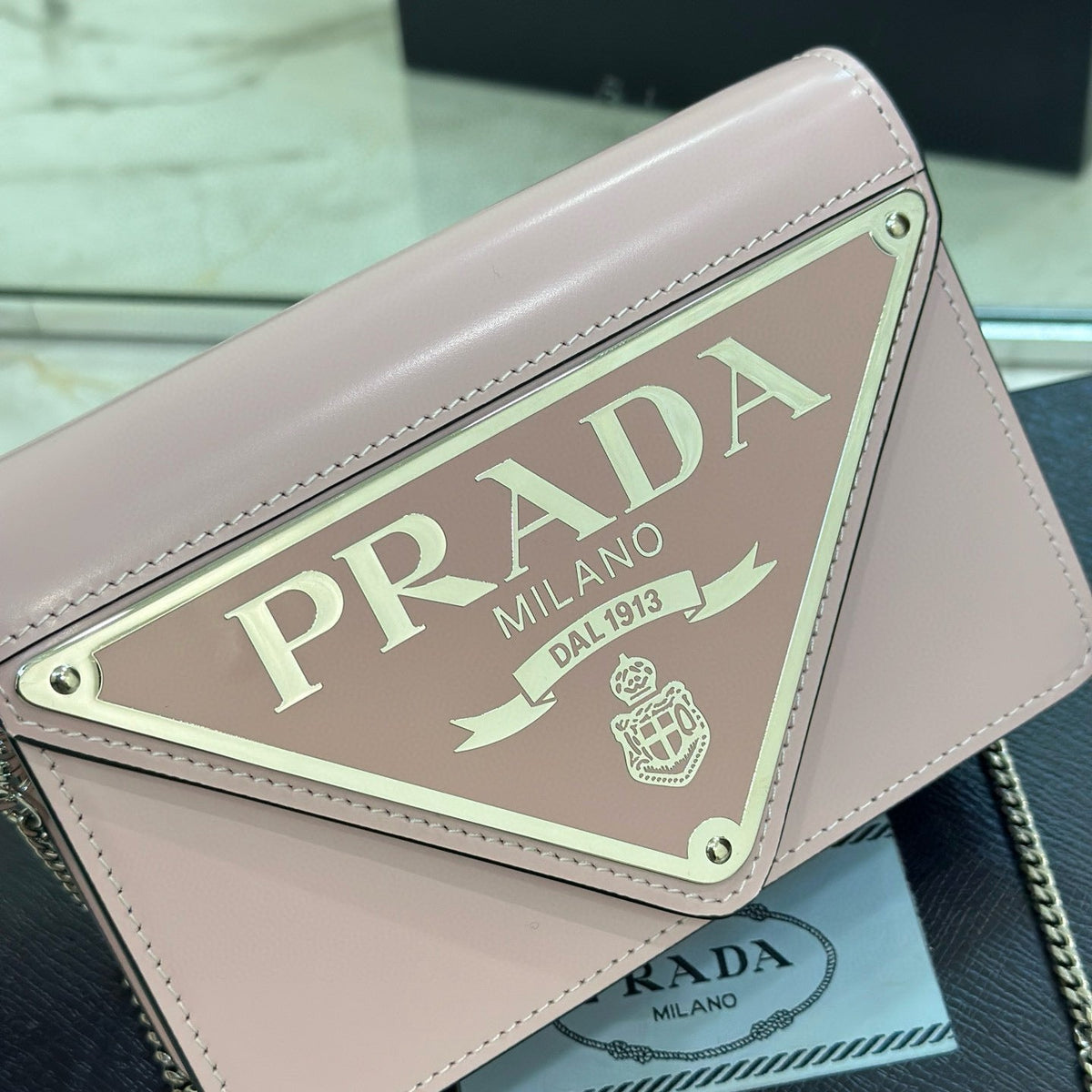 PD TRIANGLE LOGO BUFFED SHOULDER BAG