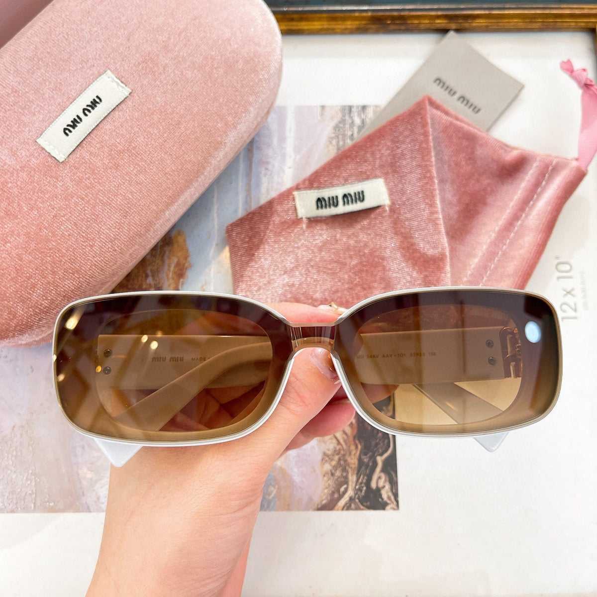 MIU M SUNGLASSES