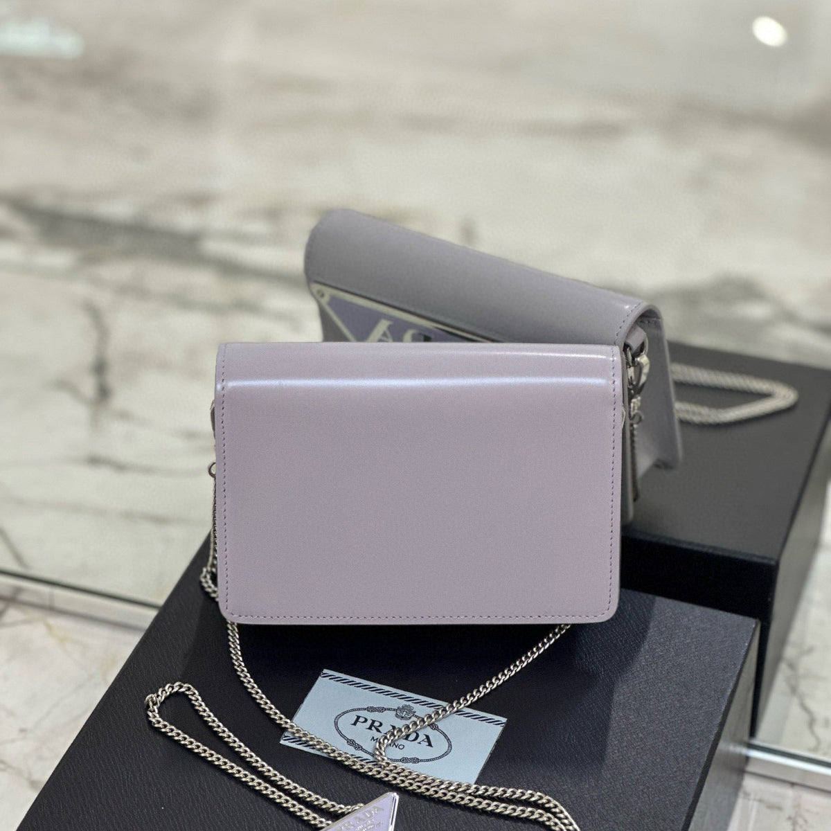PD TRIANGLE LOGO BUFFED SHOULDER BAG