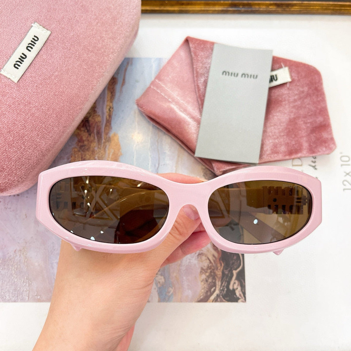 MIU M SUNGLASSES
