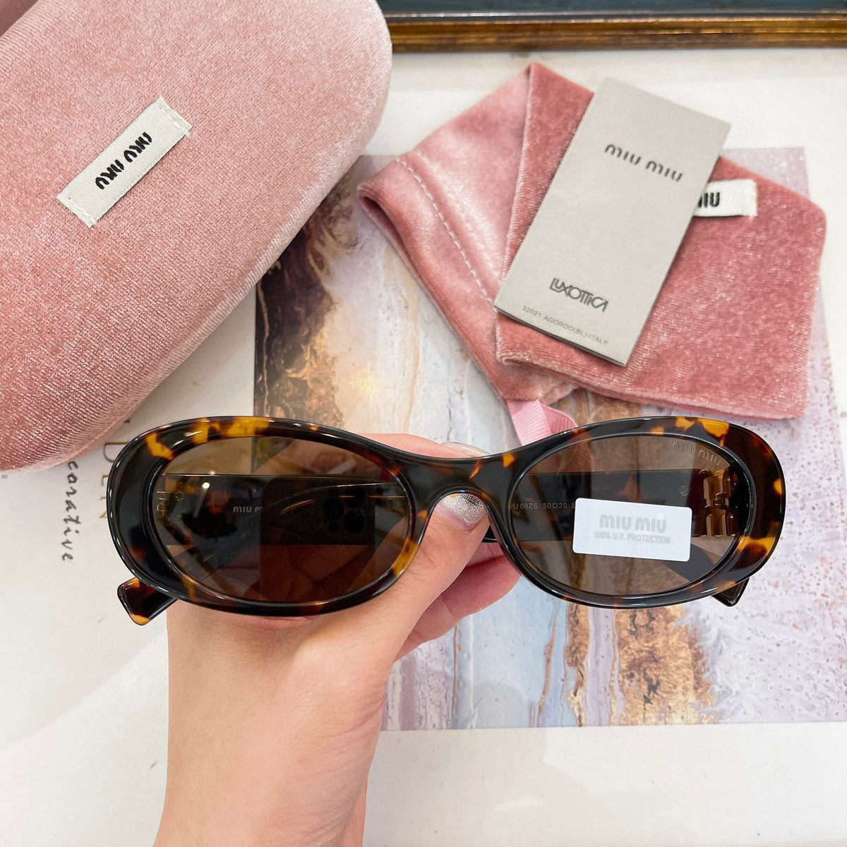MIU M SUNGLASSES