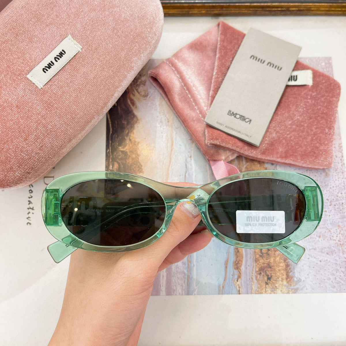 MIU M SUNGLASSES