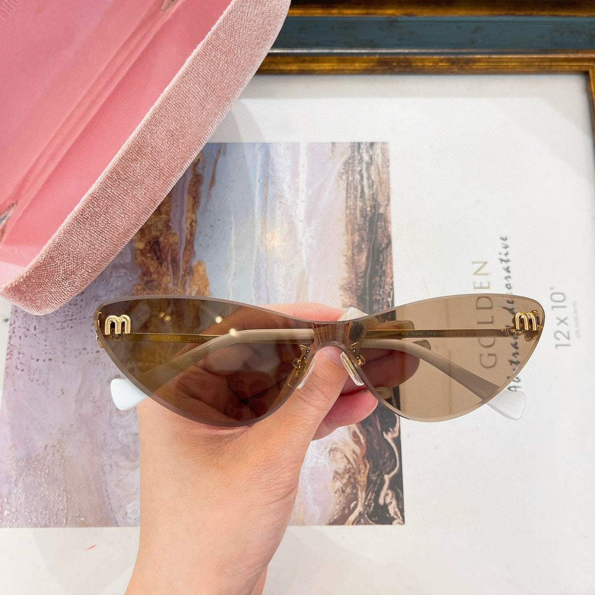 MIU M SUNGLASSES