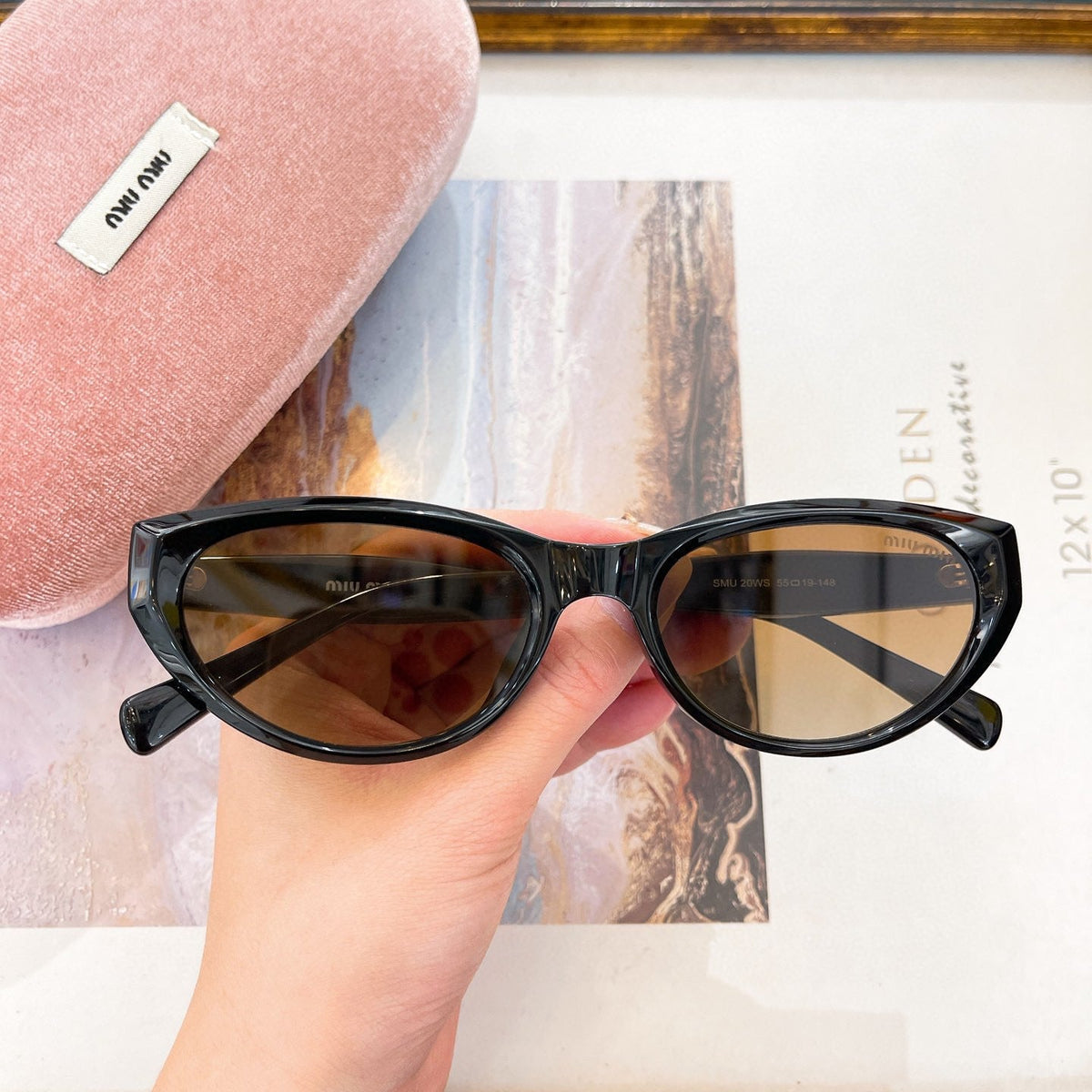 MIU M SUNGLASSES