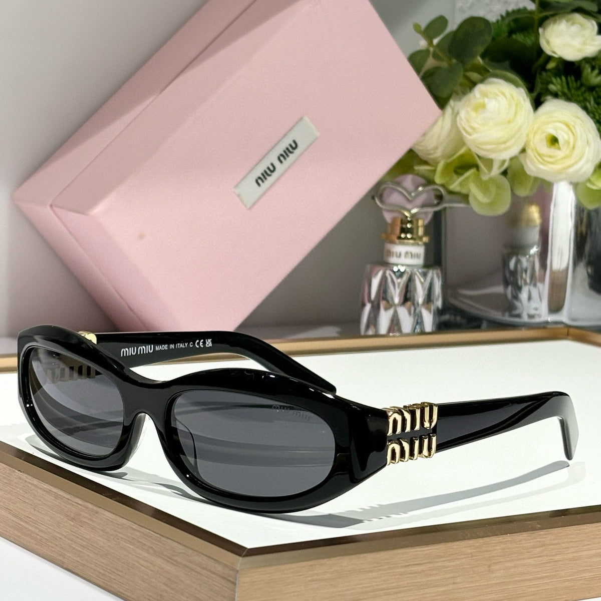 MIU M SUNGLASSES