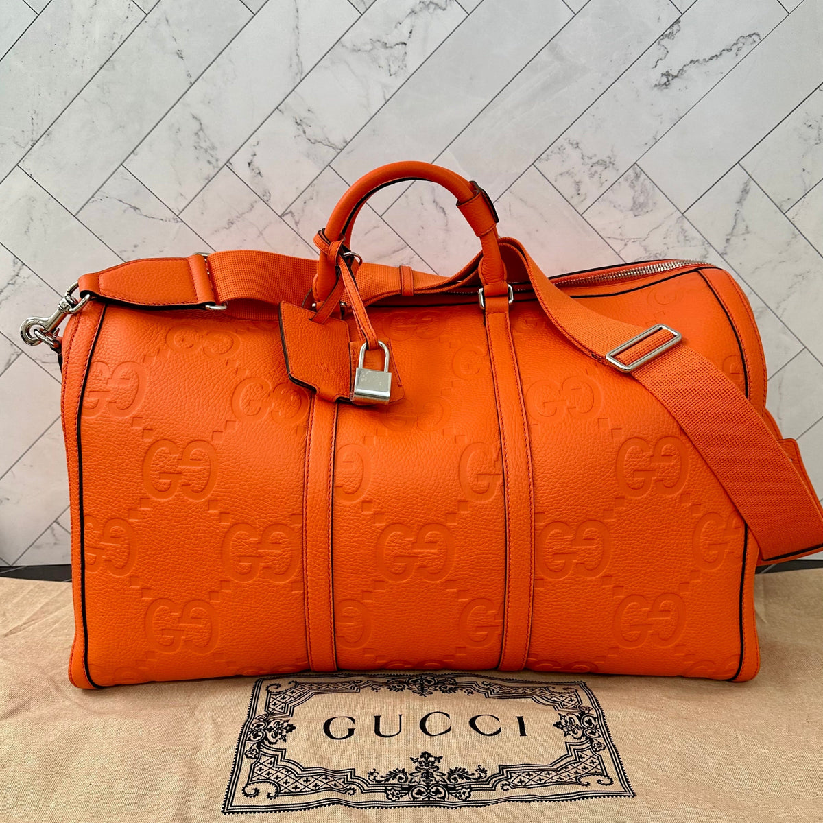 BRAND NEW Gucci Orange Jumbo GG Embossed Leather Duffle Bag Bandouliere