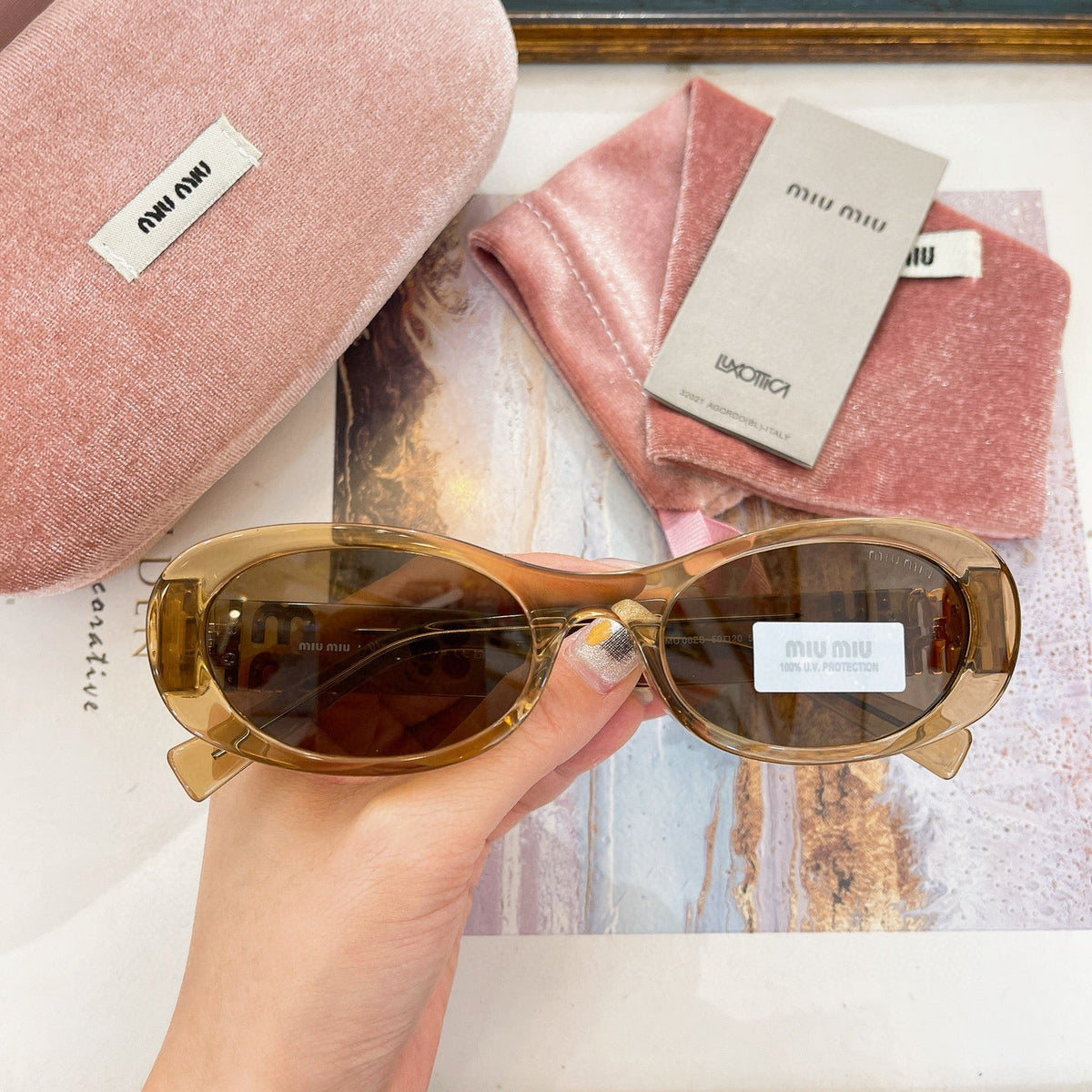 MIU M SUNGLASSES