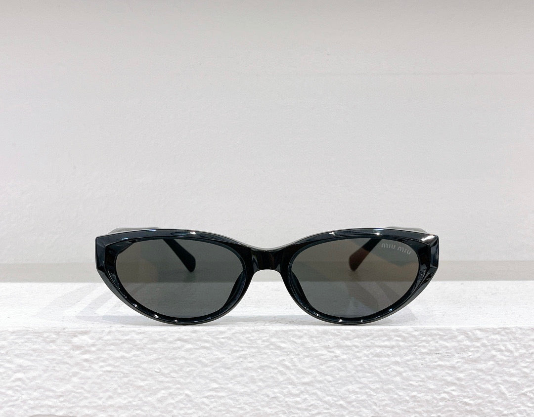 MIU M SUNGLASSES