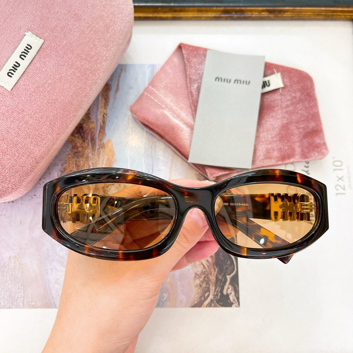 MIU M SUNGLASSES