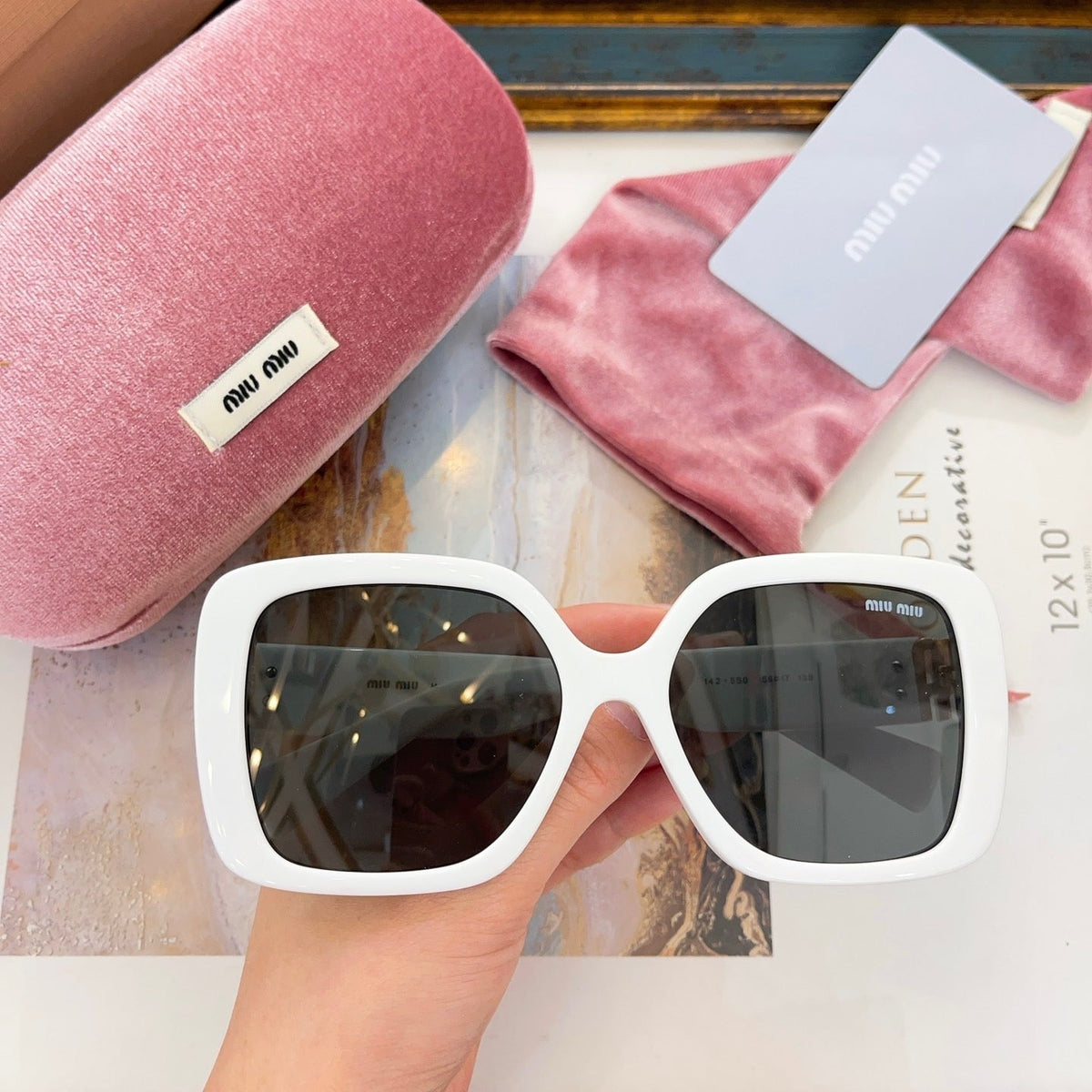 MIU M SUNGLASSES