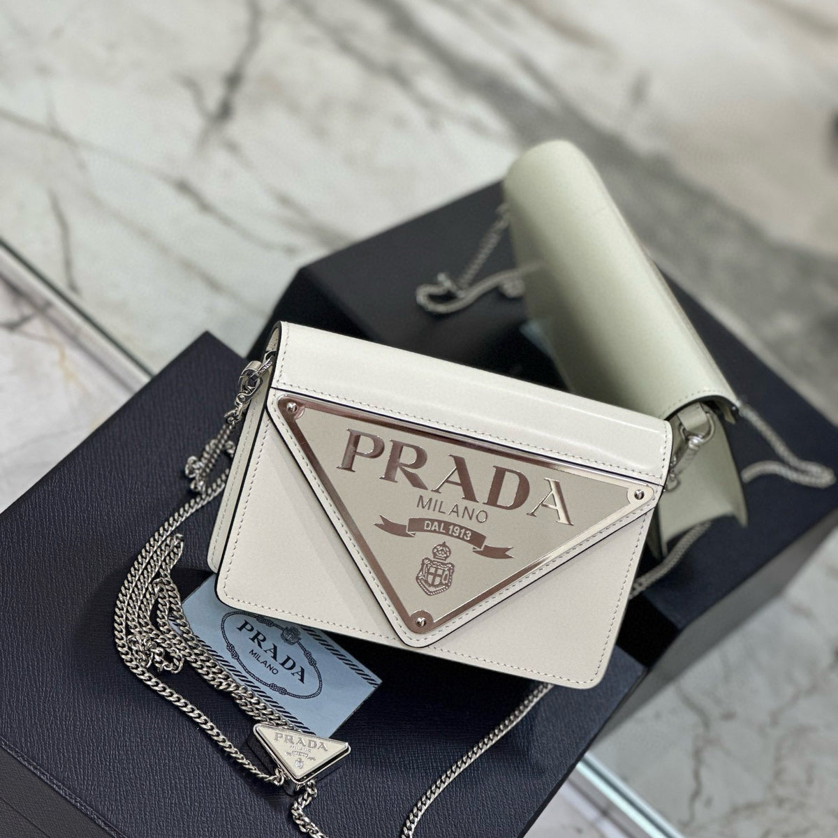 PD TRIANGLE LOGO BUFFED SHOULDER BAG