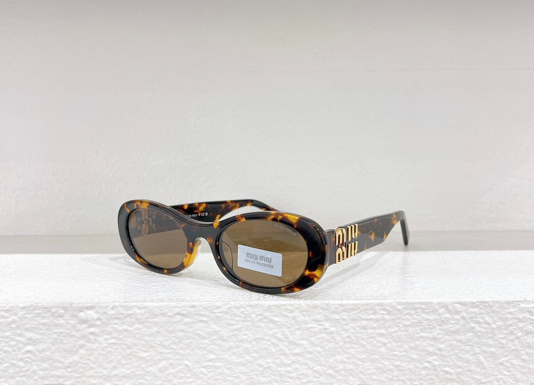 MIU M SUNGLASSES
