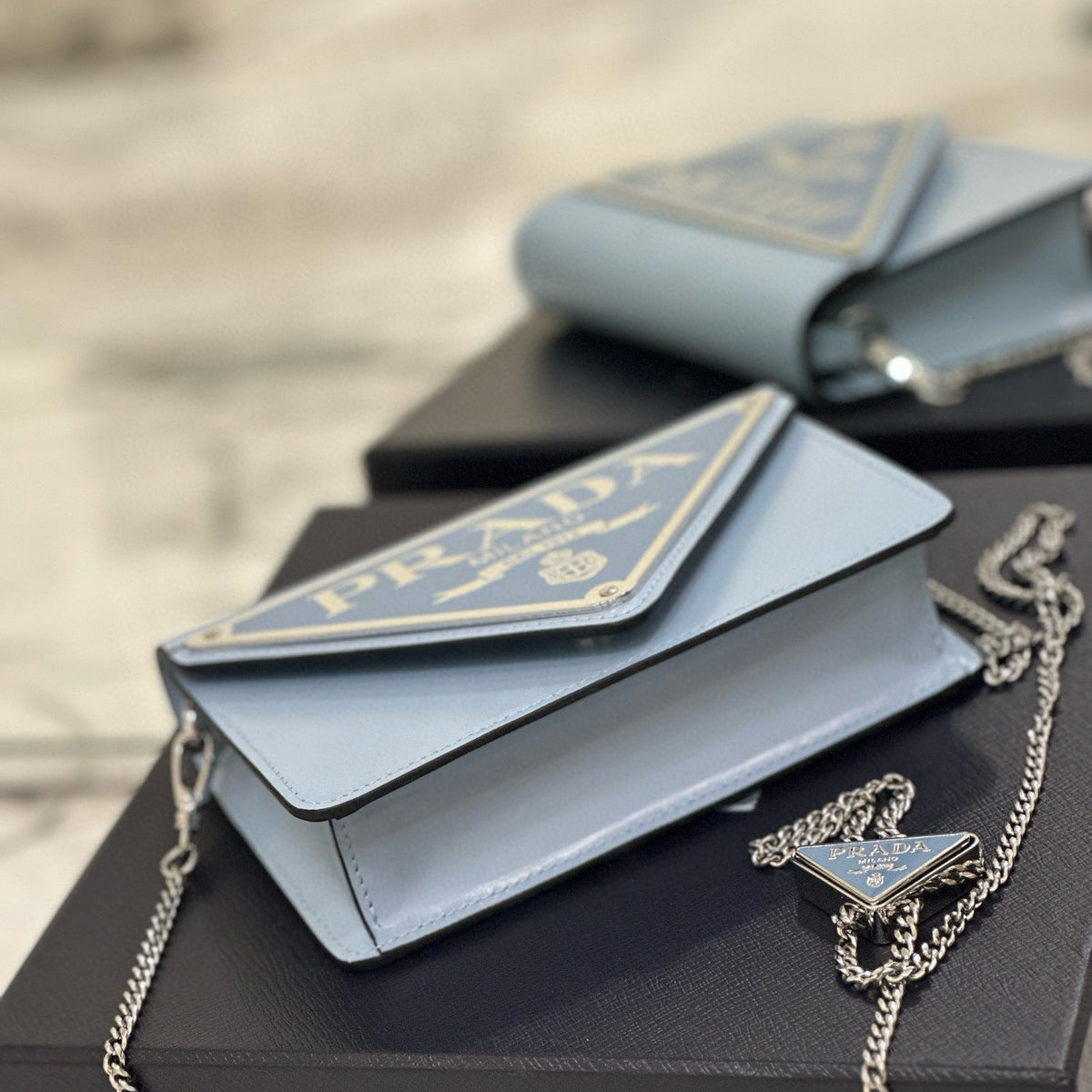 PD TRIANGLE LOGO BUFFED SHOULDER BAG