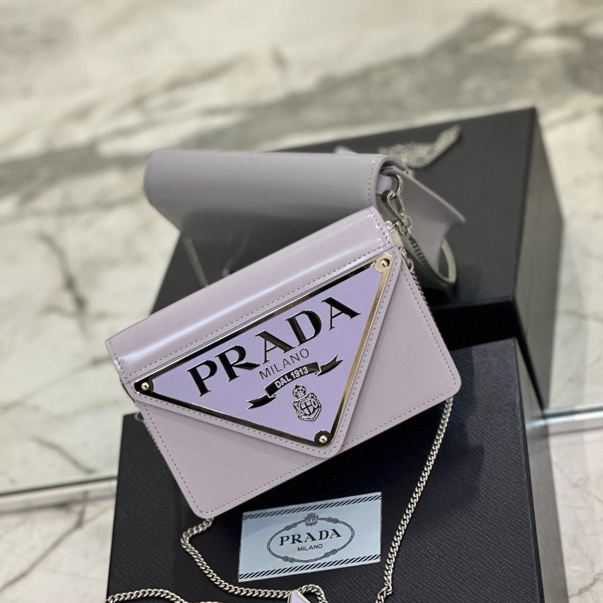 PD TRIANGLE LOGO BUFFED SHOULDER BAG
