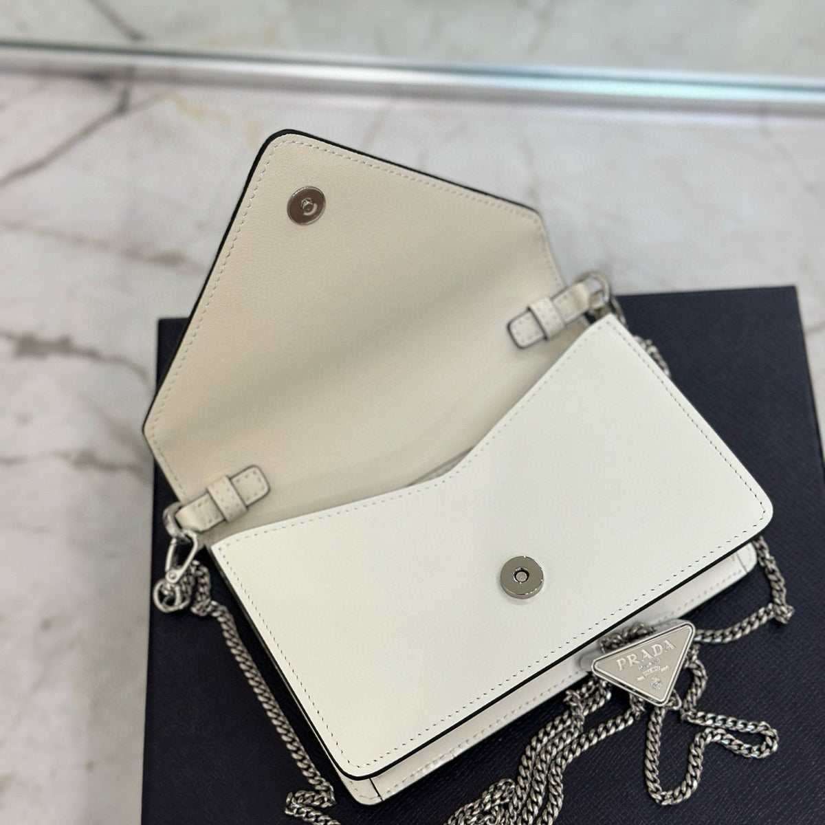 PD TRIANGLE LOGO BUFFED SHOULDER BAG