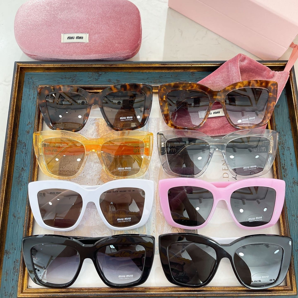 MIU M SUNGLASSES