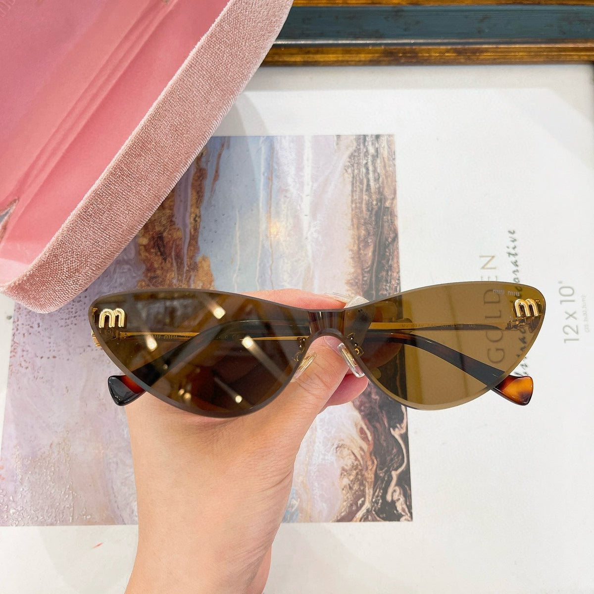 MIU M SUNGLASSES