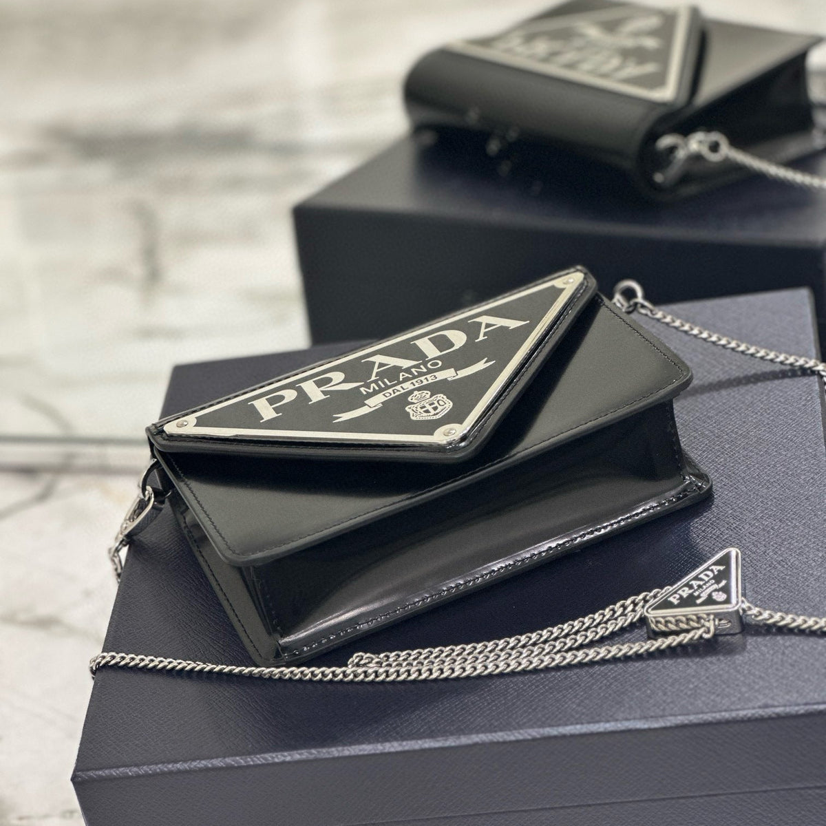 PD TRIANGLE LOGO BUFFED SHOULDER BAG