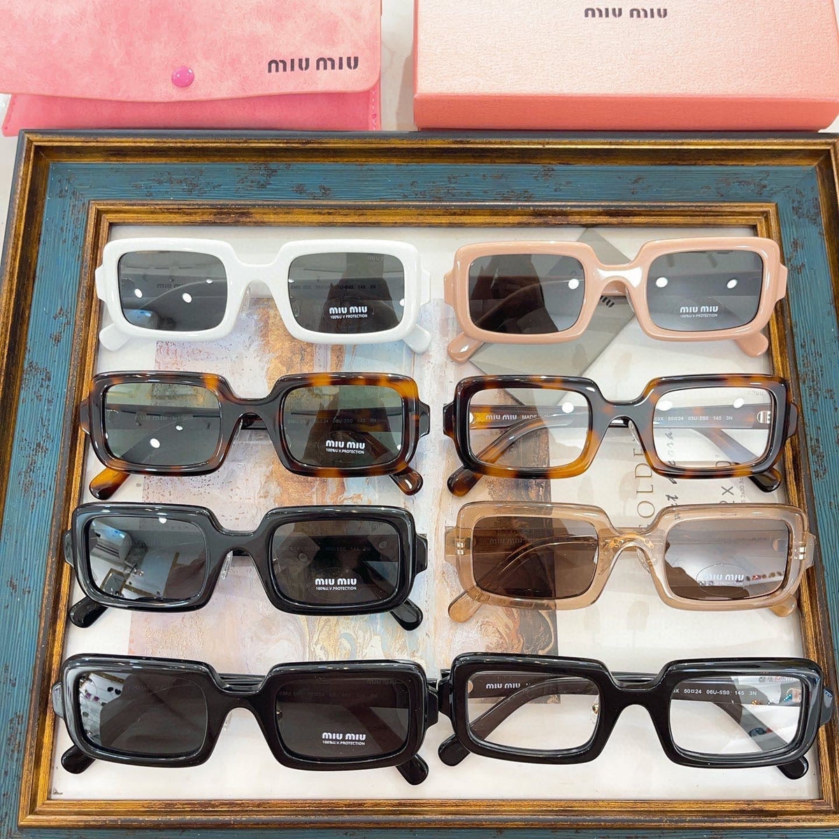 MIU M SUNGLASSES