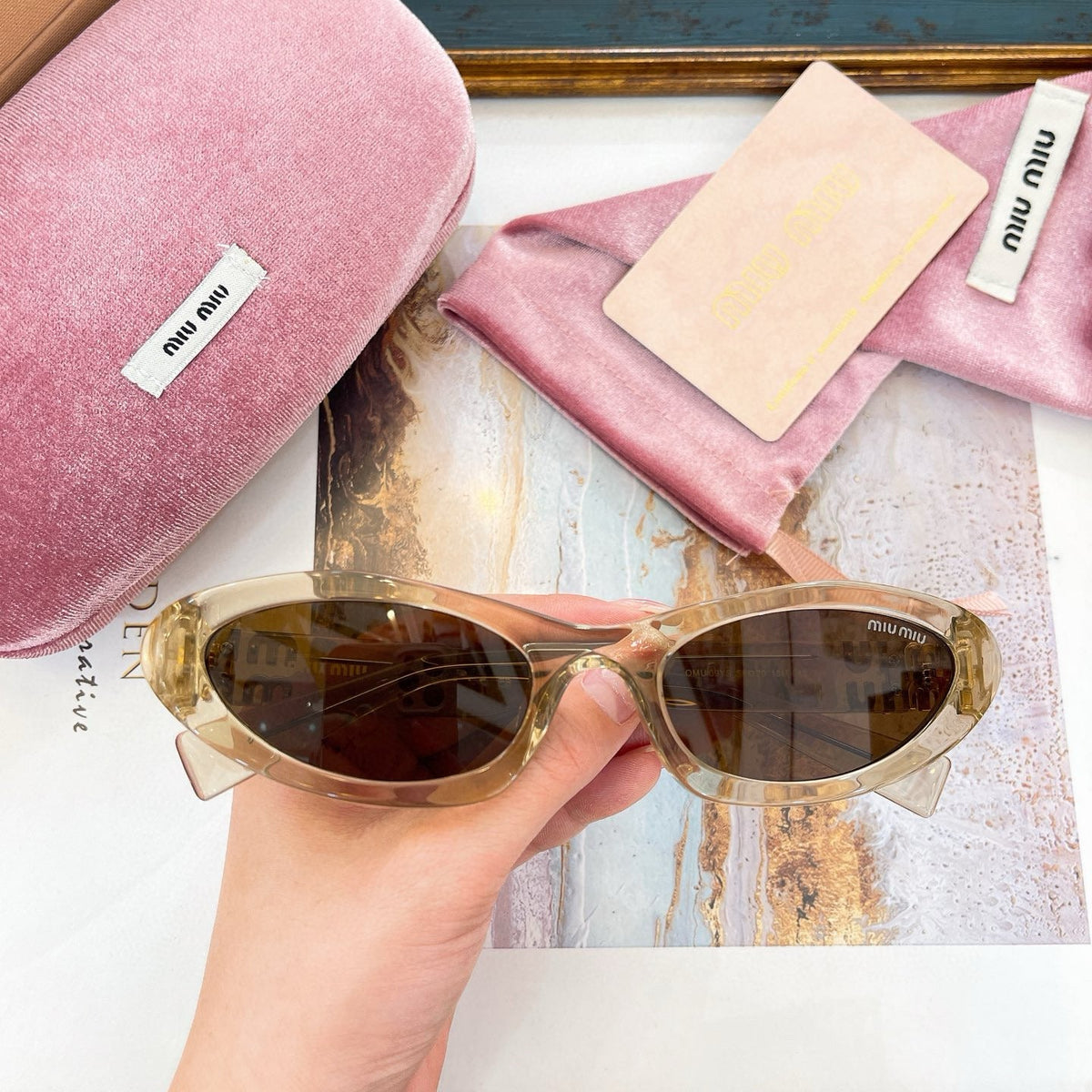 MIU M SUNGLASSES