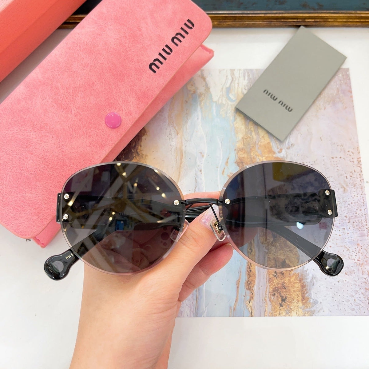 MIU M SUNGLASSES