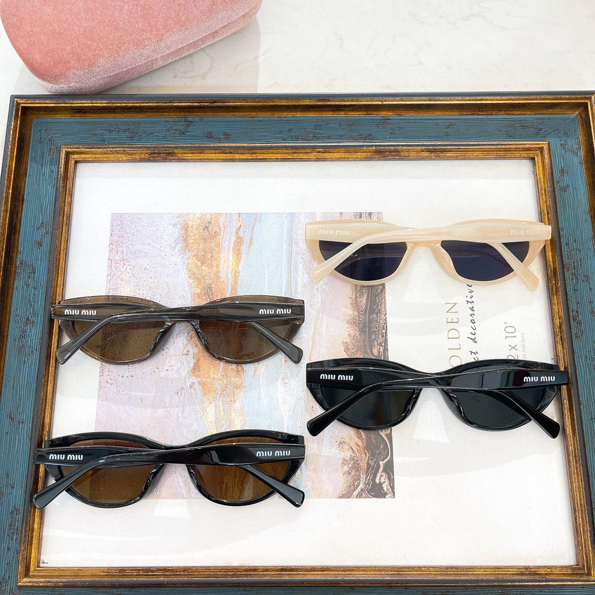 MIU M SUNGLASSES