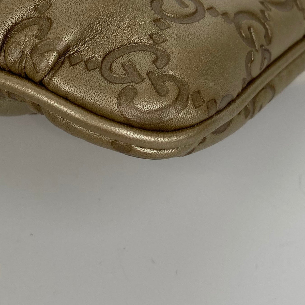 Gucci Gold Guccissima Britt Clutch