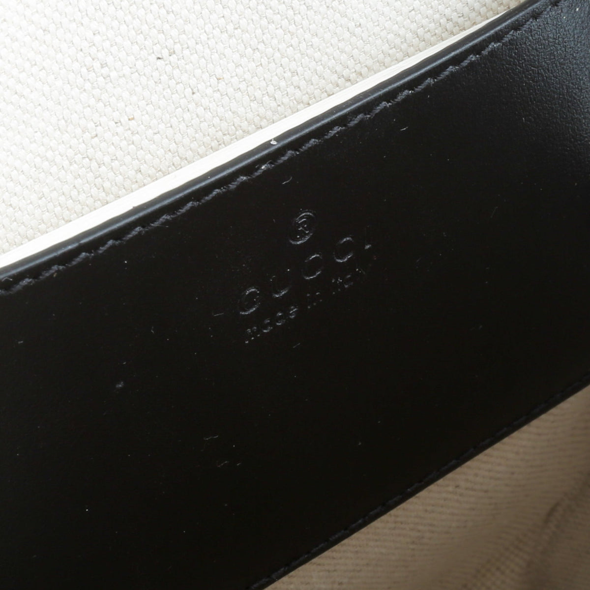 GUCCI GG Embossed Sling Bag - Black