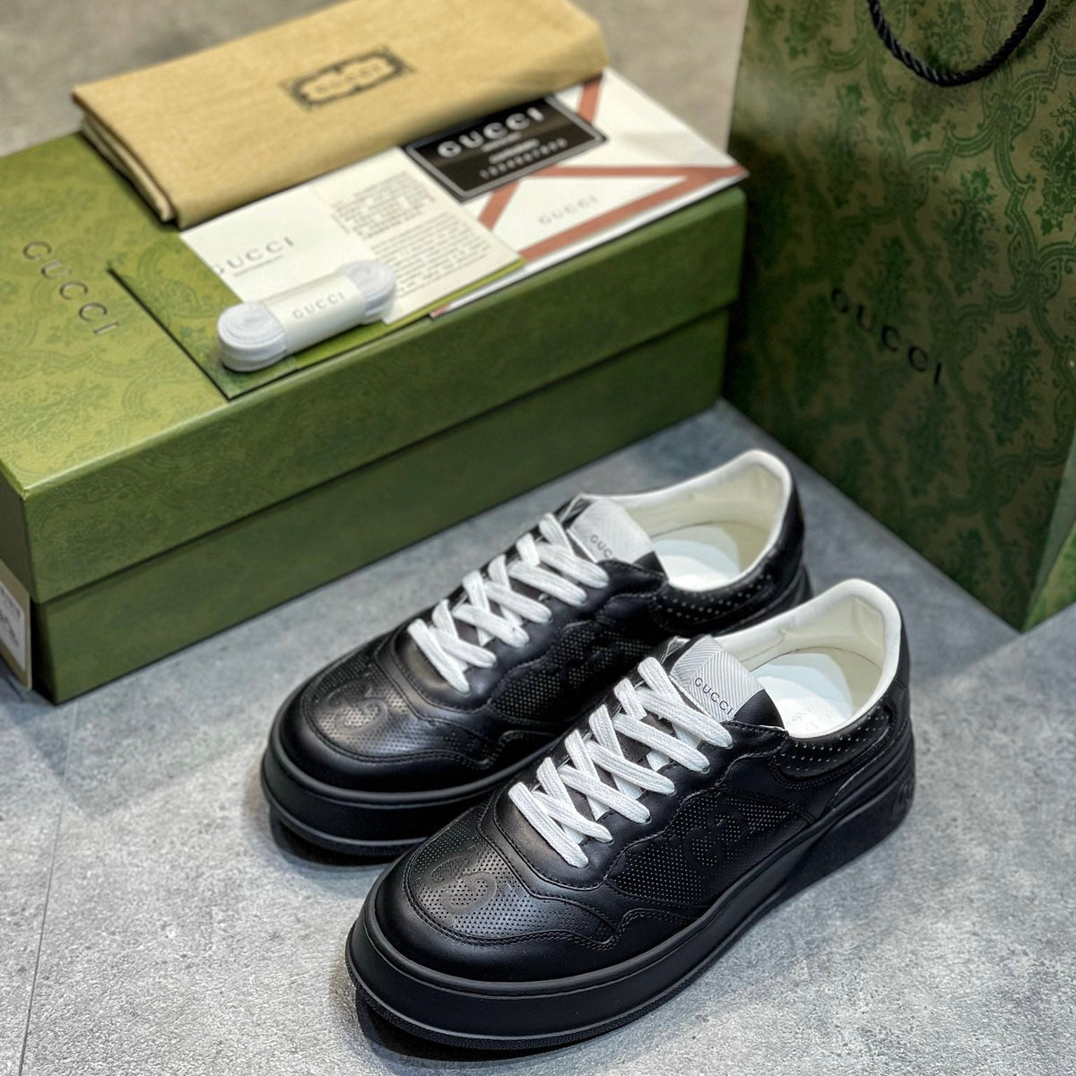 GG EMBOSSED SNEAKER