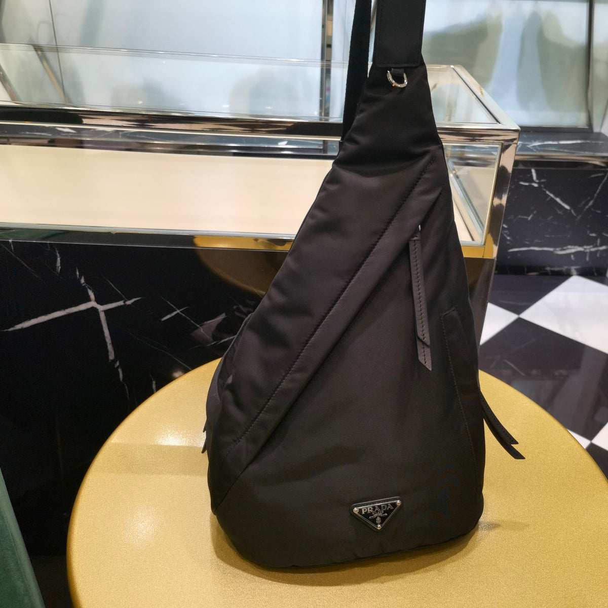 PD RE-NYLON AND LEATHER BACKPACK