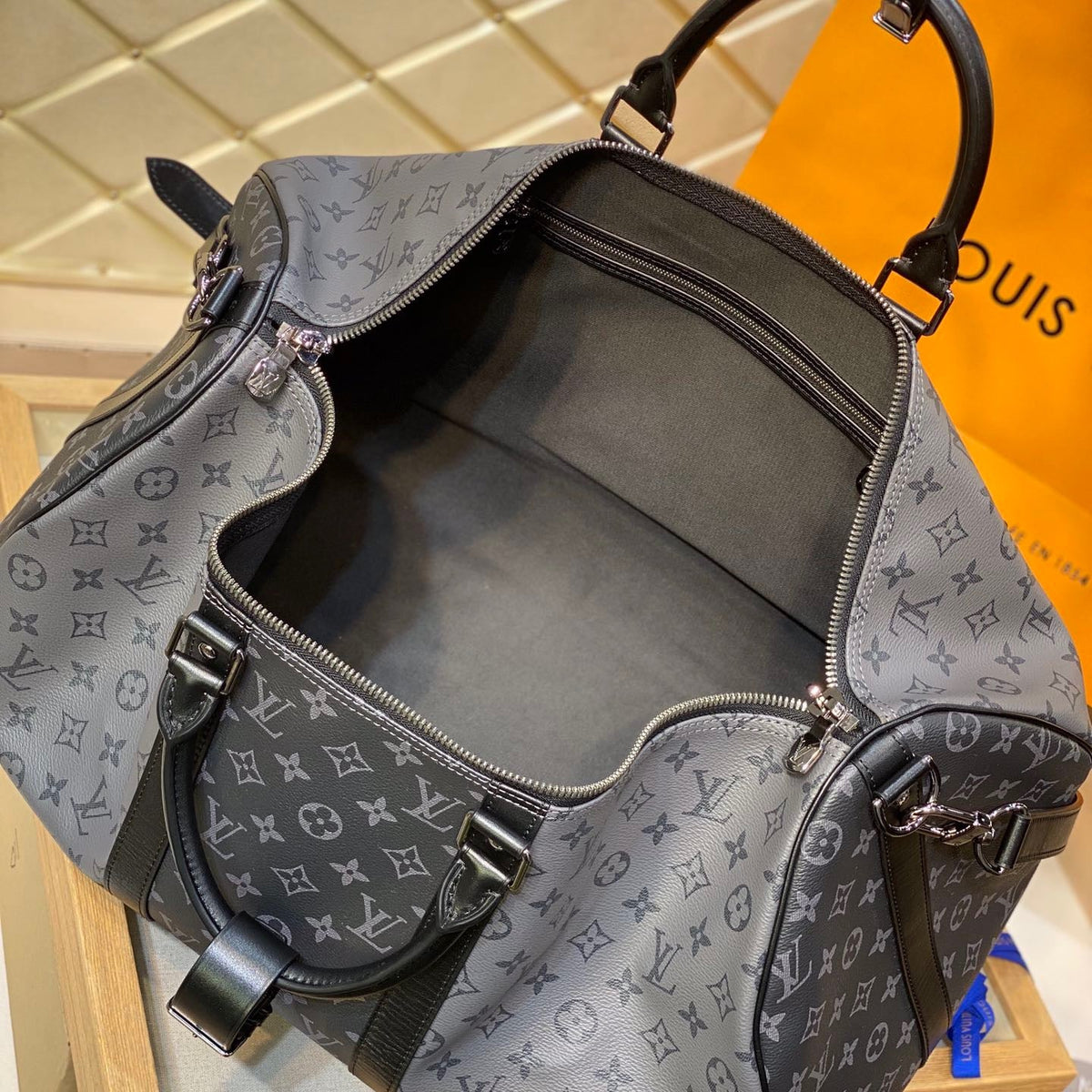 LOU KEEPALL BANDOULIÈRE 50 BAG