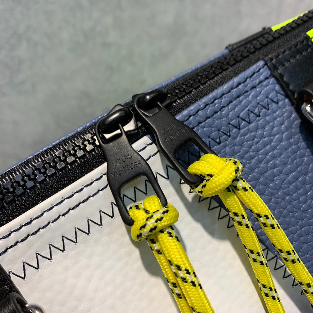 LOU KEEPALL BANDOULIÈRE 50 BAG