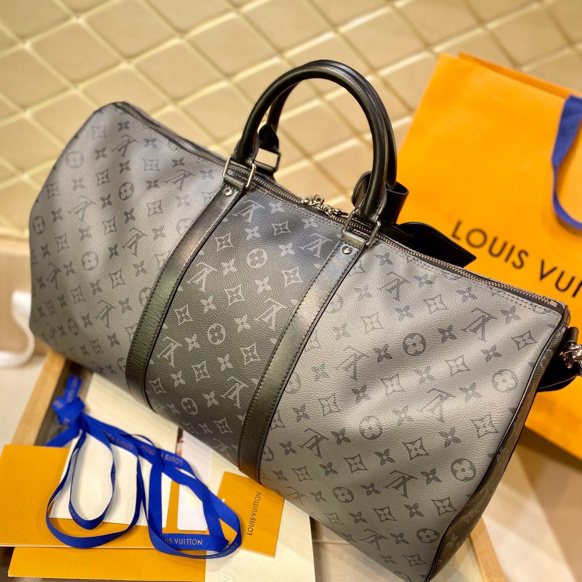 LOU KEEPALL BANDOULIÈRE 50 BAG